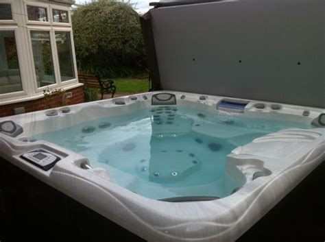 Sundance Spas 880 Series Optima, near Rhyl in Wales | Hot Tub Installations Wales | Pinterest | Spas