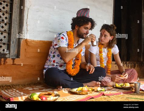 Foreigners celebrating Tihar / Bhai Tika Festival along with other Nepalese in Pokhara, Nepal ...