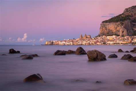 Sunset at Cefalu beach 1266616 Stock Photo at Vecteezy