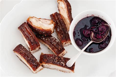 Twice-cooked spiced pork belly with cherry sauce