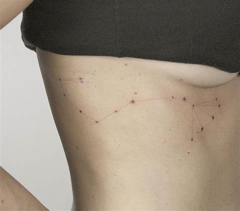 Fine line Scorpius constellation tattoo on the right