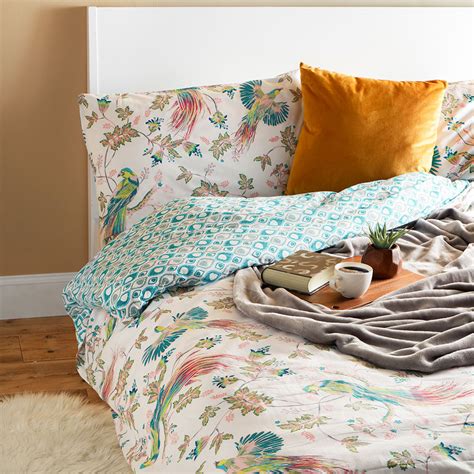 This pretty Primark bedding set features a grown-up rainbow print ...