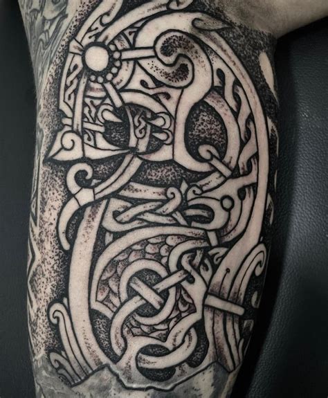 What Do Jörmungandr Tattoos Symbolize?