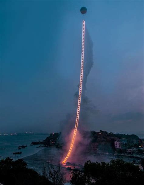 cai guo-qiang sends flaming sky ladder soaring 500 meters in the air