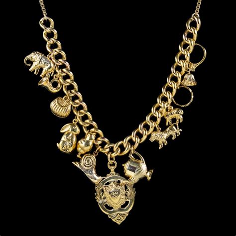 Vintage Gold Charm Necklace 9ct Gold 12 Charms And Medallion Dated 1920