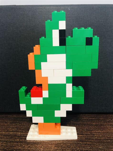 Yoshi lego | Lego super mario, Lego projects, Cool lego creations