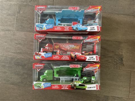 New Disney Cars Team Lot Race-O-Rama Haulers. Team Dinoco, HTB, And ...