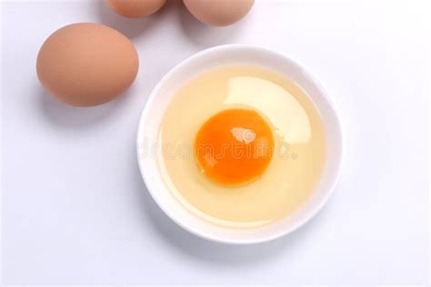 Raw yellow egg yolk macro stock photo. Image of yolk - 181264166