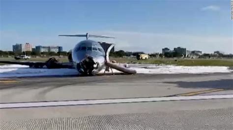 Plane crash-lands in Miami after landing gear failure - CNN Video