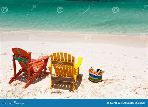 Colorful Lounge Chairs at Caribbean Beach Stock Photo - Image of ...