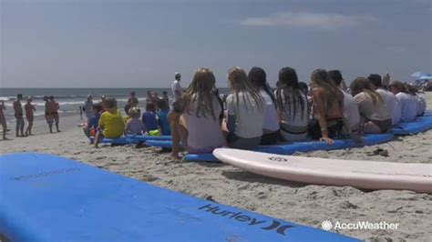 Perfect weather for surfing lessons in Long Beach, New York | wgrz.com