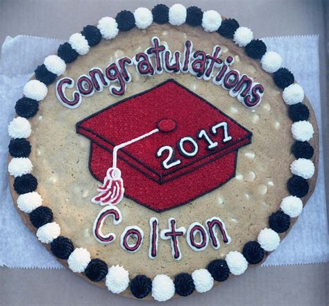 Graduation cookie cake. White chocolate chip cookie Graduation Cake Pops, Graduation Party Foods ...