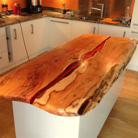 Kitchen island with live edge Yew and dark Amber resin. By Green Tree ...