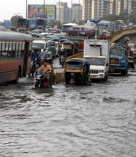 Traffic jam and flood waters during Mumbai's rains. Mumbai's monsoons causes chaos on the roads ...