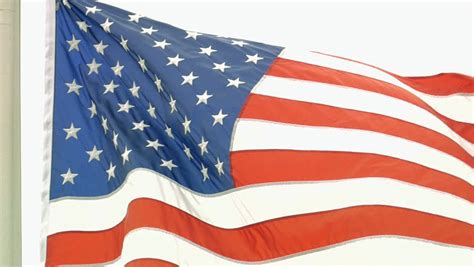 Slow Motion American Flag Waving In The Wind. Stock Footage Video ...