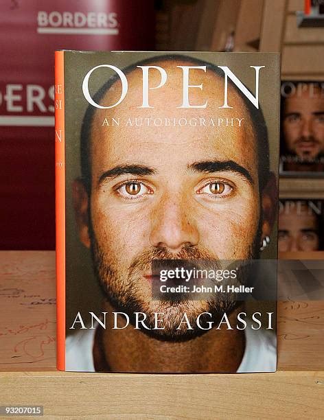 Andre Agassi Signs His New Book Open Photos and Premium High Res ...