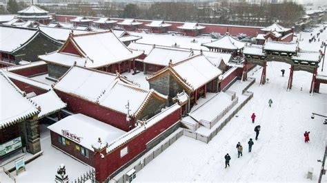 China: North-eastern city sees highest snowfall in 116 years - BBC News