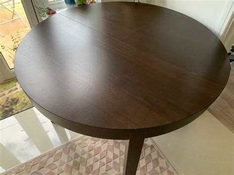 IKEA BJURSTA brown-black extendable table round oval oblong | in Monmouth, Monmouthshire | Gumtree