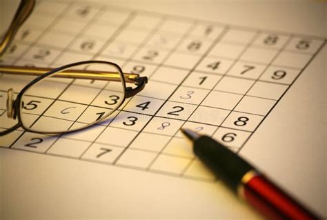 Sudoku stock image. Image of puzzles, coffee, open, gold - 1224785