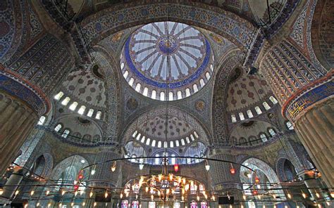 The stunning interior of the 17th-century Sultan Ahmed Mosque in Istanbul, Turkey, popularly ...