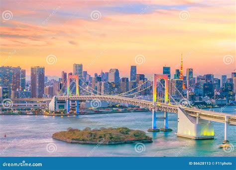 Tokyo Skyline with Tokyo Tower and Rainbow Bridge Stock Image - Image ...