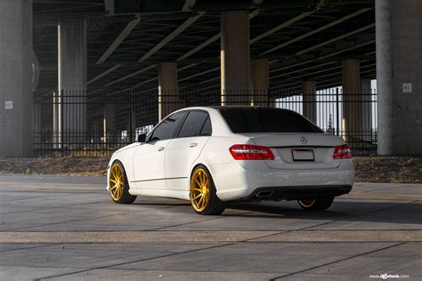 Striking Looks of White Mercedes E-Class Wearing Gold Avant Garde ...