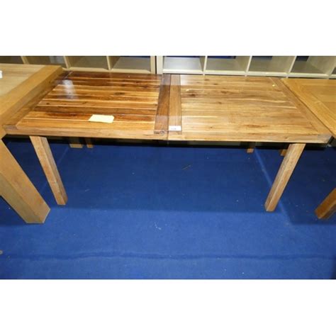 A wooden dining table approx 175x83cm