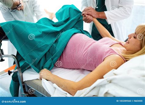 In the Hospital Woman in Labor Pushes To Give Birth, Obstetricians Assisting Stock Photo - Image ...