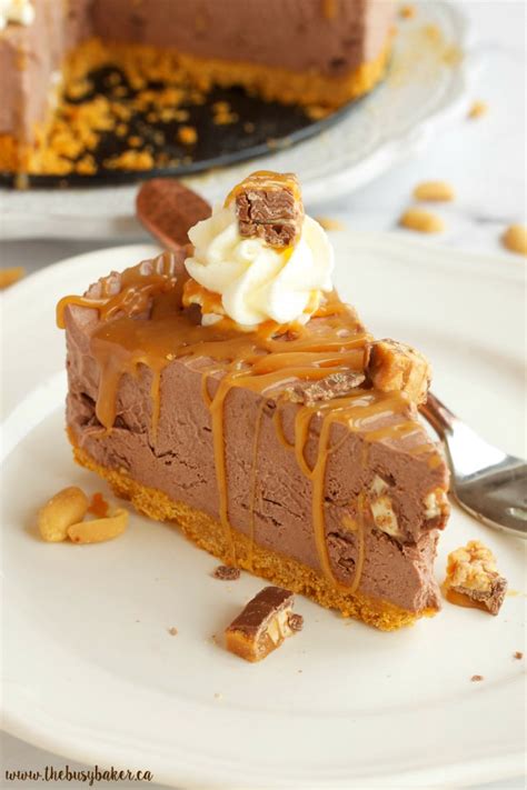 Easy No Bake Snickers Cheesecake - The Busy Baker