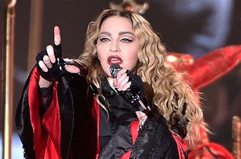 Madonna struggles to walk after fall during Paris concert