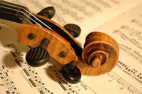 Violin scroll with music | Photo Phiend | Flickr