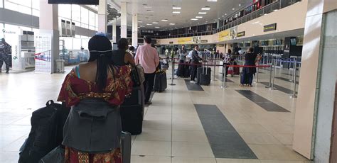 PHOTOS: Another batch of passengers heading for UK going through ...