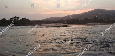 Candy colored sunset over Malibu Lagoon at dusk in Malibu California ...