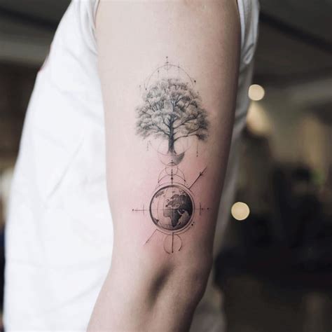 Tattoo uploaded by Tattoodo • Earth and tree tattoo by Nando #Nando #EarthDaytattoos #EarthDay # ...