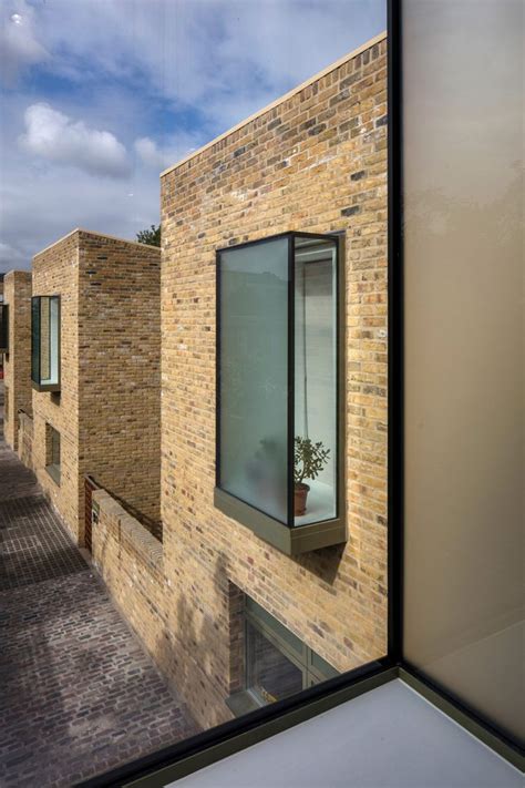 Peter Barber uses oriel windows for facades of Moray Mews houses ...