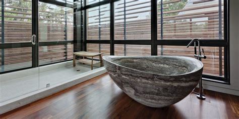 20 Bathroom Designs With Stunning Stone Tubs