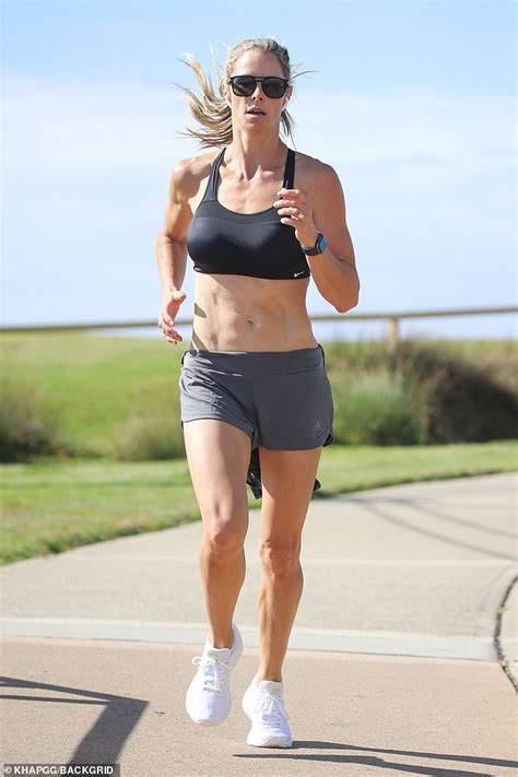 SAS star Candice Warner shows off her incredible abs while running in ...