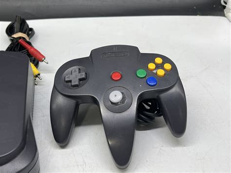 Urban Auctions - N64 CONSOLE W/ CORDS & CONTROLLER - RESET BUTTON STUCK - EASY FIX