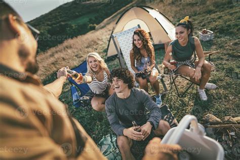 Friends Camping Together 13705656 Stock Photo at Vecteezy