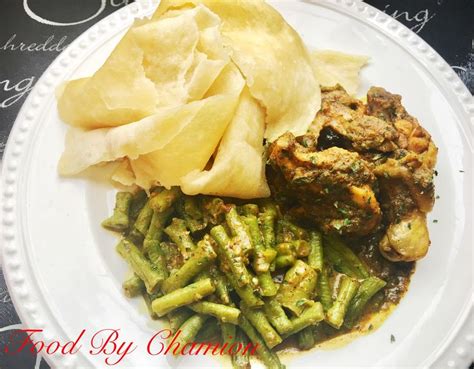 Trinidad & Tobago buss up shut(roti) curry bodi in coconut milk and curry chicken by Chamion 🇹🇹 ...