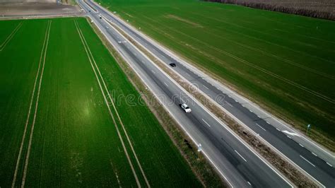 Aerial View of Traffic on Two Lane Road through Countryside and Cultivated Fields Stock Photo ...