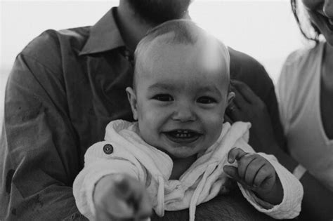 Premium Photo | Black and white photo happy family having fun playing ...