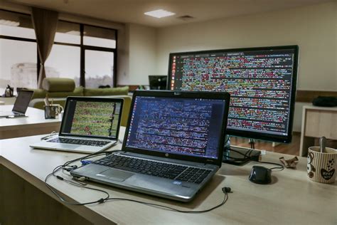 Free stock photo of coding, laptop, monitors