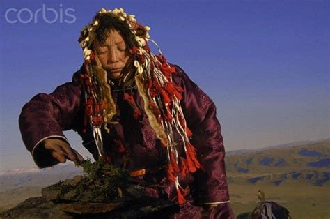 A Tuvan shaman burning cedar on a mountain top in western Mongolia. | Shaman woman, Shaman ...