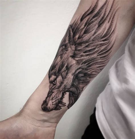 Wolf Tattoo on Forearm by Rowes Binley