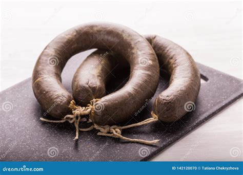 Food, Meat and Delicious Concept - Sliced Horse Meat Sausage with Cumin Stock Photo - Image of ...