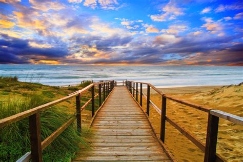 Download Horizon Sunset Ocean Beach Walkway Man Made Path 4k Ultra HD Wallpaper