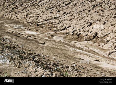 Dry sand erosion from the stream Stock Photo - Alamy