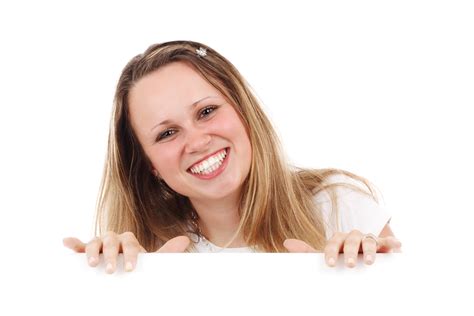 Smiling Woman Behind Board Free Stock Photo - Public Domain Pictures