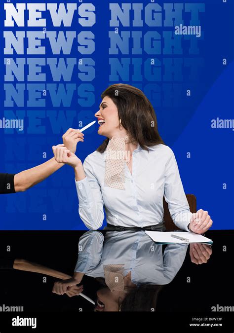 News presenter in make up Stock Photo - Alamy